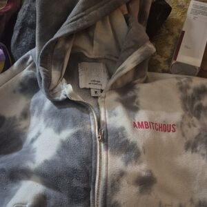 Refuge Athletics gray tie-dye zip-up hoodie featuring the word "AMBITCHOUS"